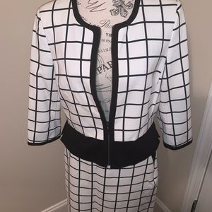 Bold black-and-white grid pattern suit